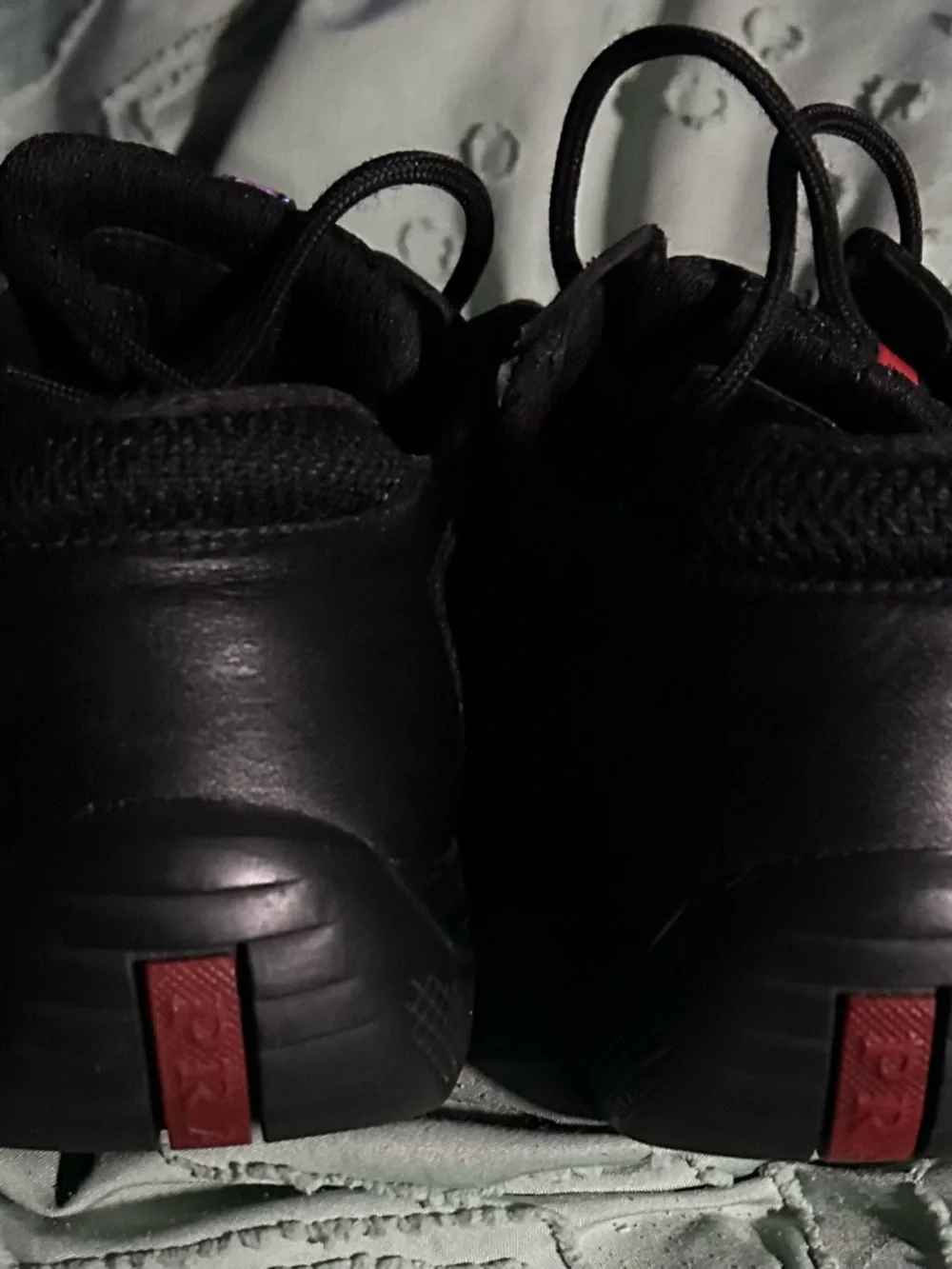 Prada Black Low-Top Sneakers with Red Logo Strips - Picture 2 of 4